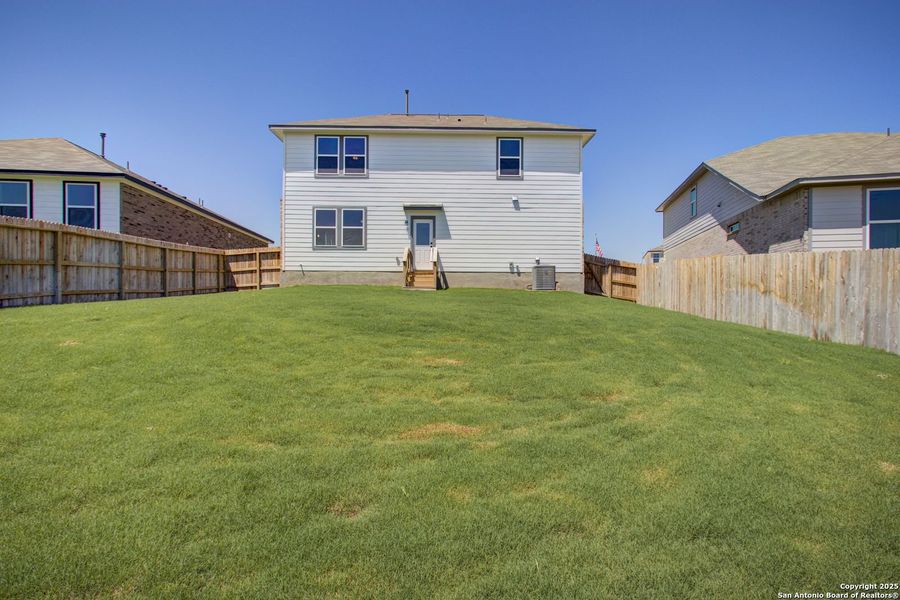Front exterior of a new home in Comanche Ridge, San Antonio, TX, highlighting curb appeal (Image 68).