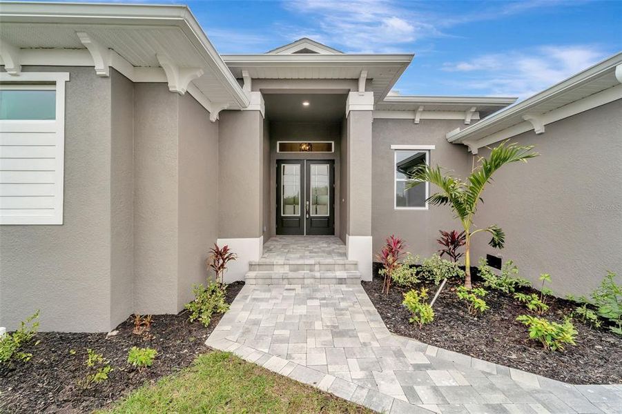 Front exterior of a new home in , Port Charlotte, FL, highlighting curb appeal (Image 21). Front exterior of a new home in , Port Charlotte, FL, highlighting curb appeal (Image 21).