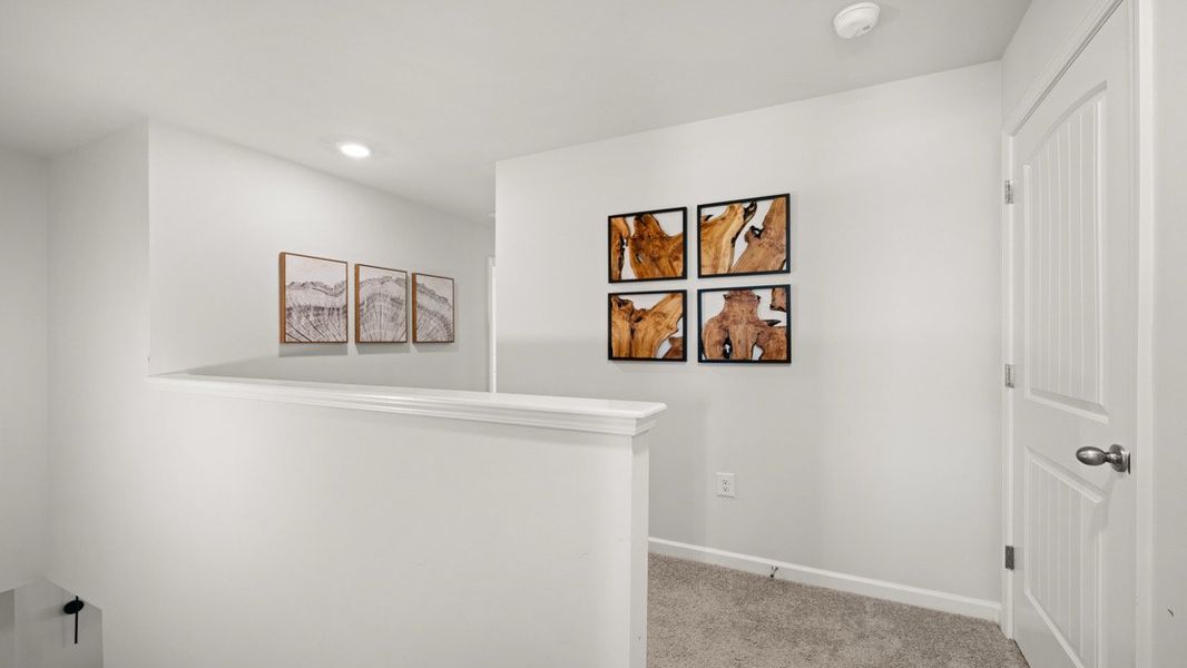 Representative furnished interior of a home built from the SUDBURY 24' TOWNHOME by D.R. Horton in Rolling Meadows, Jasper (Image 25).