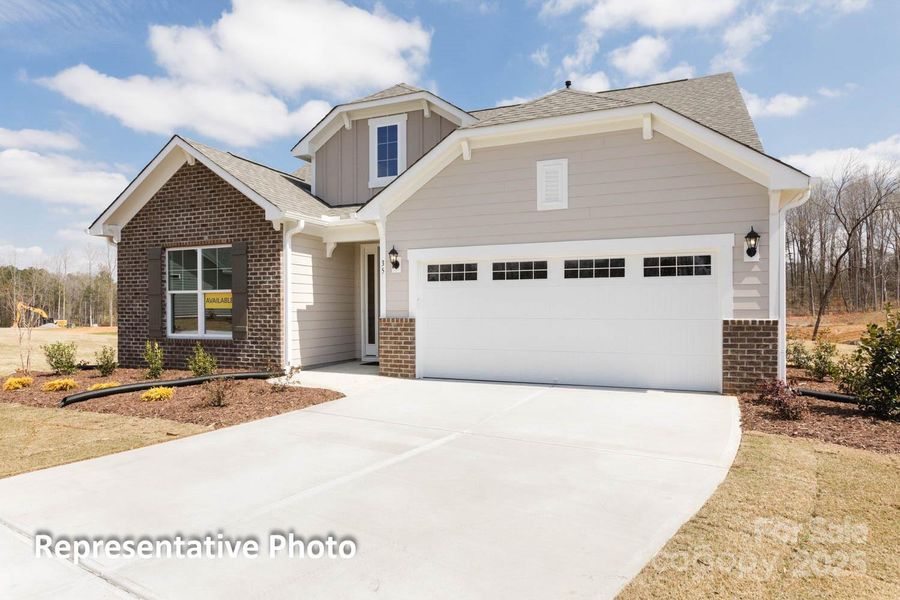 Front exterior of a new home in Villas at Prestwick, Mooresville, NC, highlighting curb appeal (Image 1).