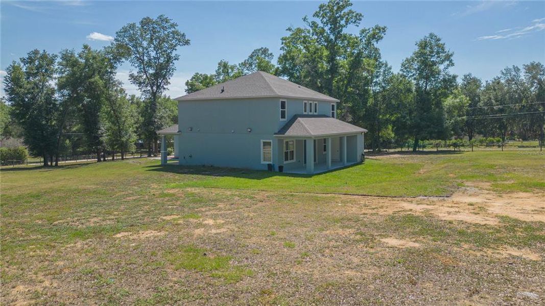 Exterior details and patio area of a home in , Dade City (Image 27).