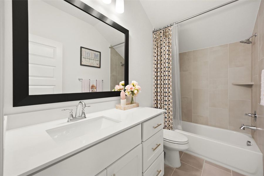 Furnished interior view inside a new home in Bridgeland, Cypress (Image 14).