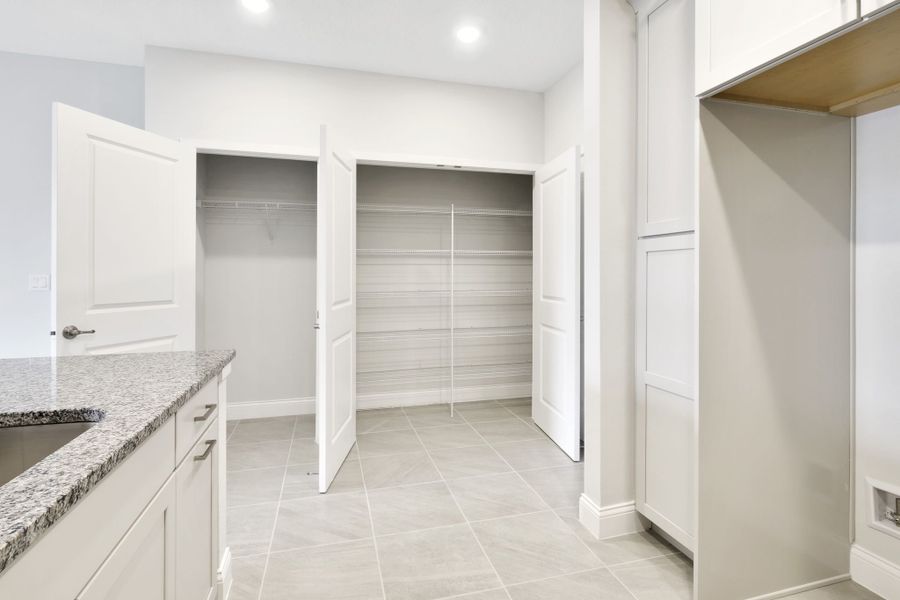 Furnished interior view inside a new home in Gatherings® of Lake Nona, Orlando (Image 9).