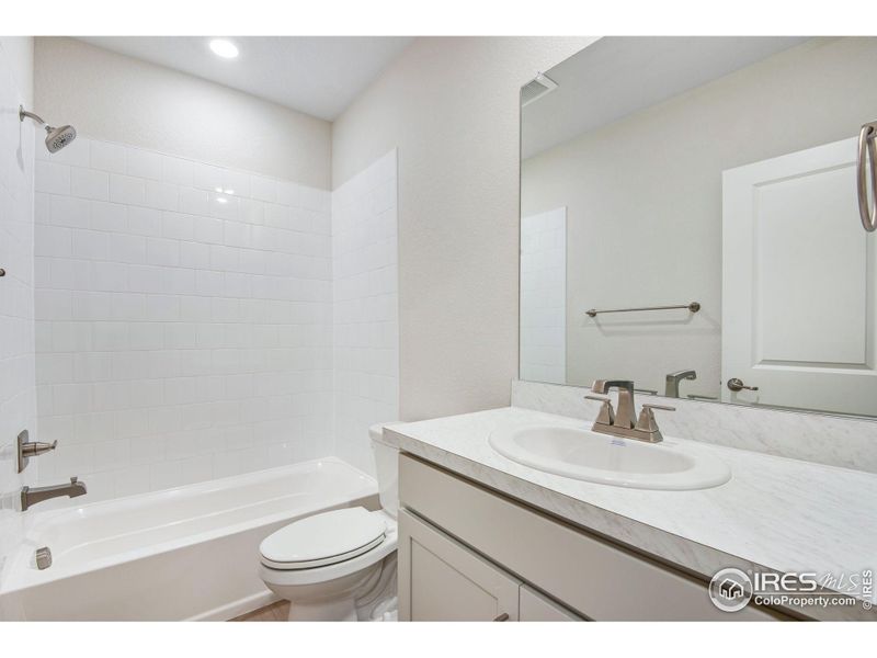 Furnished interior view inside a new home in Westside Crossing Paired Homes, Berthoud (Image 12).