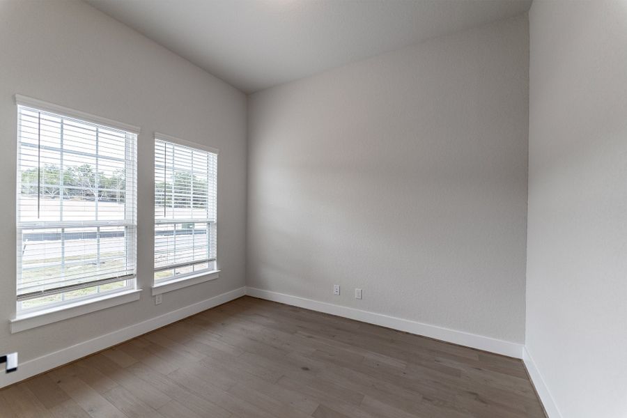 Spacious, unfurnished interior of a new home in The Woodlands at Medina Hills, Mico (Image 14).