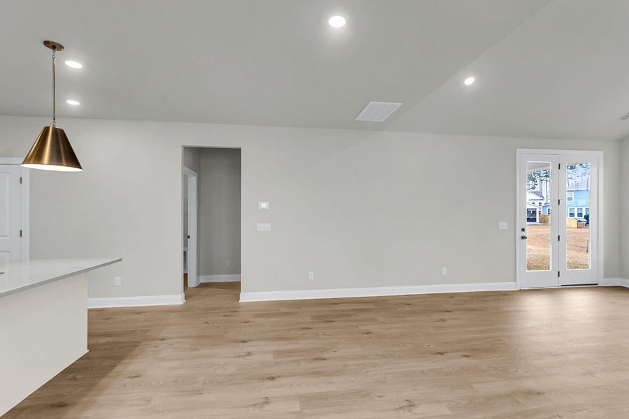 Spacious, unfurnished interior of a new home in Tidewater at Lakes of Cane Bay, Summerville (Image 20).