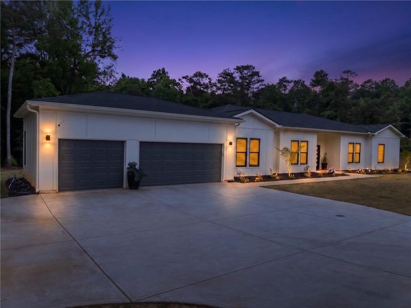 Front exterior of a new home in , Ellenwood, GA, highlighting curb appeal (Image 24).