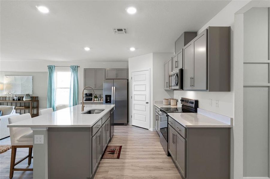 Furnished interior view inside a new home in Wind Meadows South, Bartow (Image 10).