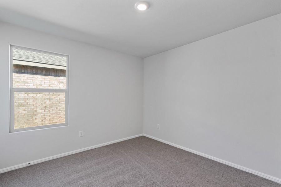 Representative unfurnished interior of a home built from the TEXAS CALI by D.R. Horton in Faculty Row, Abilene (Image 44).