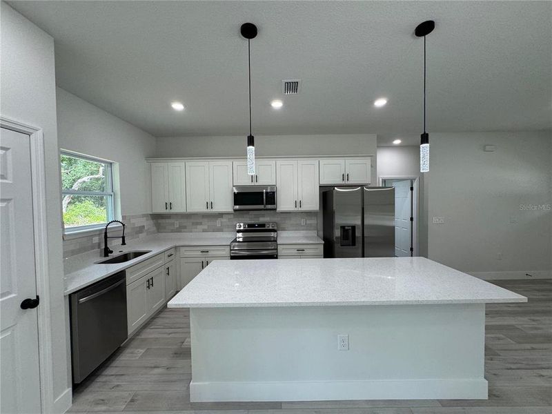 Furnished interior view inside a new home in , Citrus Springs (Image 11).