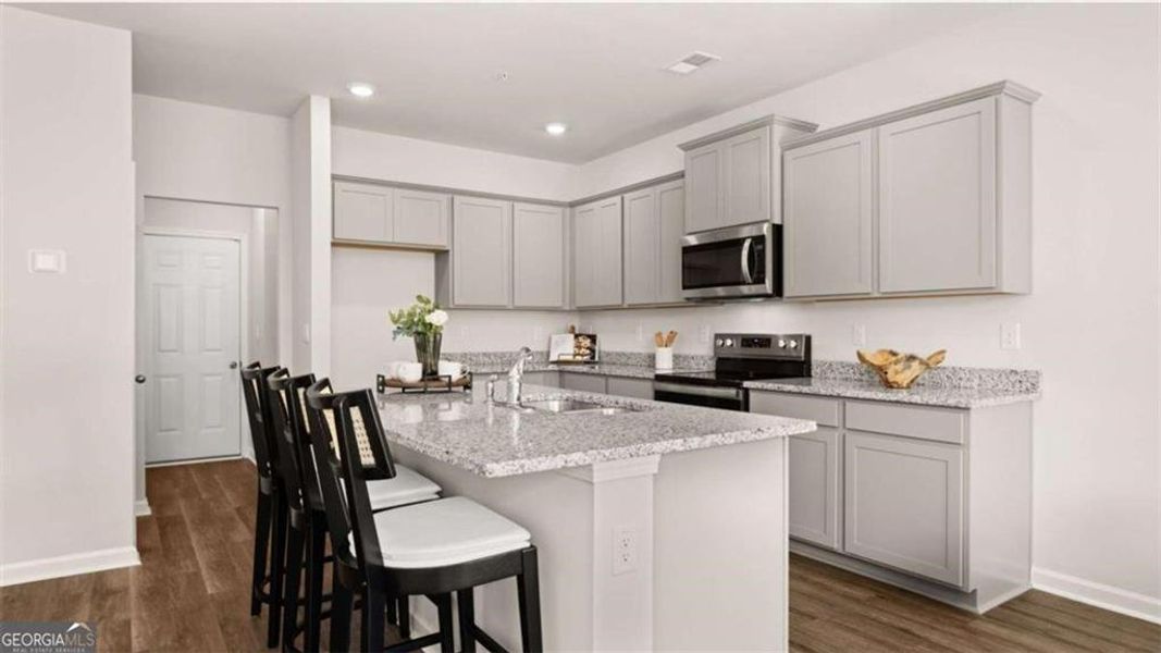 Furnished interior view inside a new home in Echo Glen, Stockbridge (Image 6).