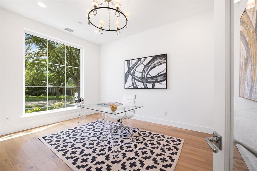 Home office featuring a chandelier, light wood-style flooring, and recessed lighting Home office featuring a chandelier, light wood-style flooring, and recessed lighting