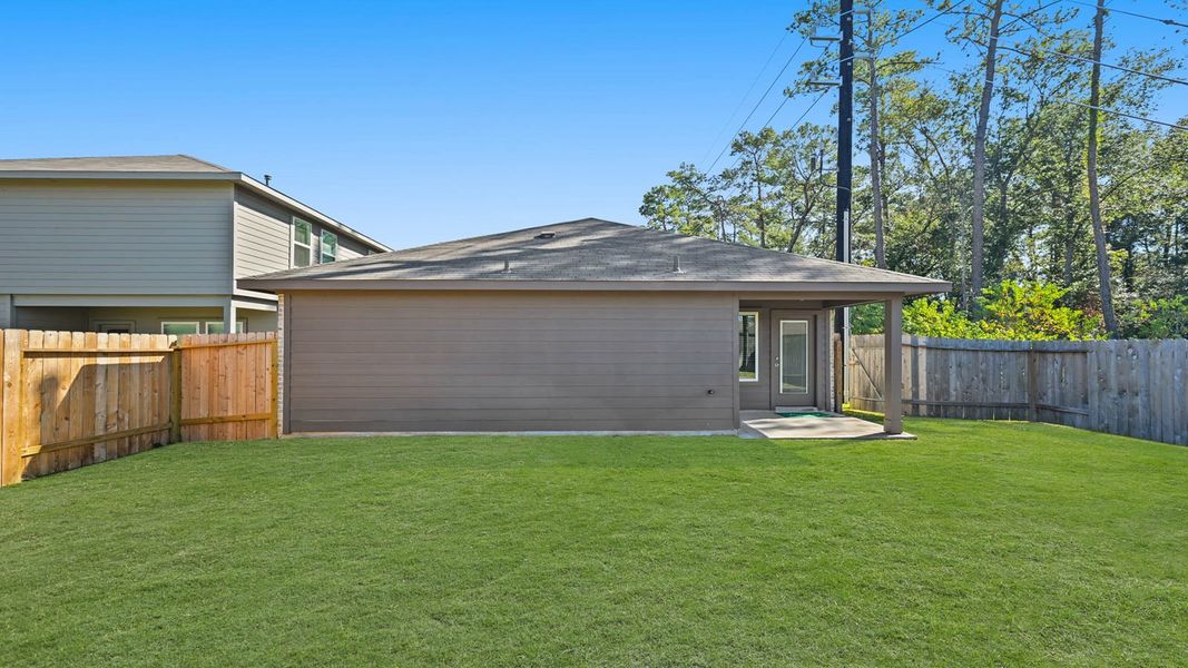 Exterior details and patio area of a home in Breckenridge Forest, Spring (Image 3). Exterior details and patio area of a home in Breckenridge Forest, Spring (Image 3).