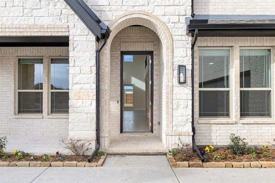 Exterior details and patio area of a home in Wildflower Ranch 60-65, Fort Worth (Image 3).