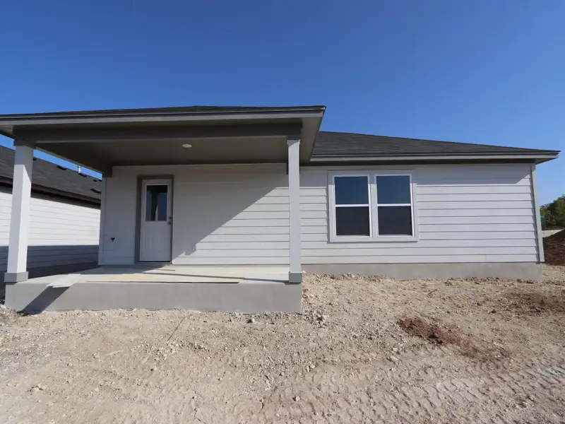 Exterior details and patio area of a home in Marble Creek Crossing, Austin (Image 2). Exterior details and patio area of a home in Marble Creek Crossing, Austin (Image 2).