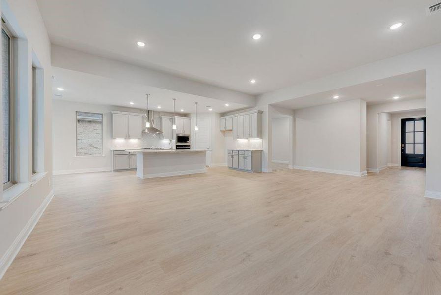 Spacious, unfurnished interior of a new home in Valencia On The Lake, Little Elm (Image 34).