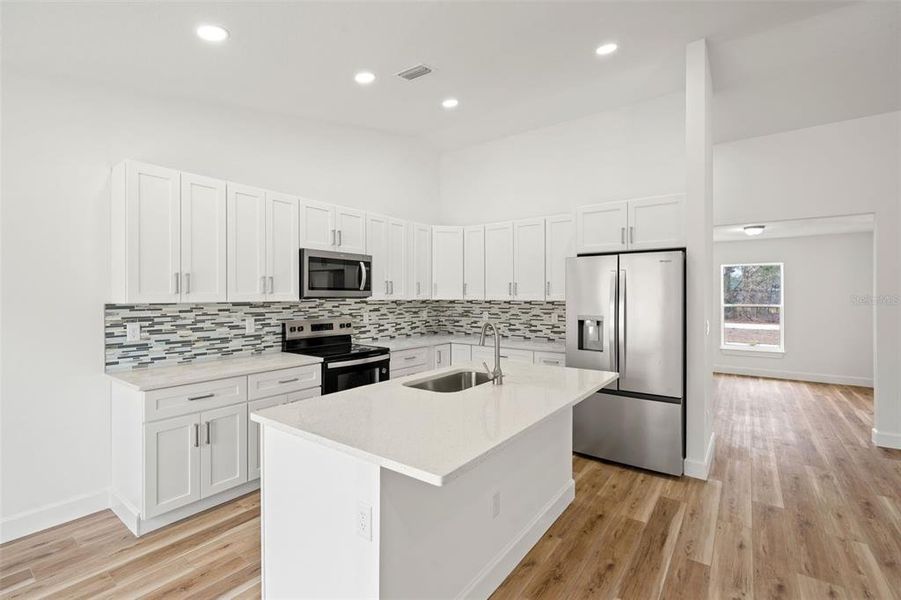 Furnished interior view inside a new home in , Weeki Wachee (Image 13).