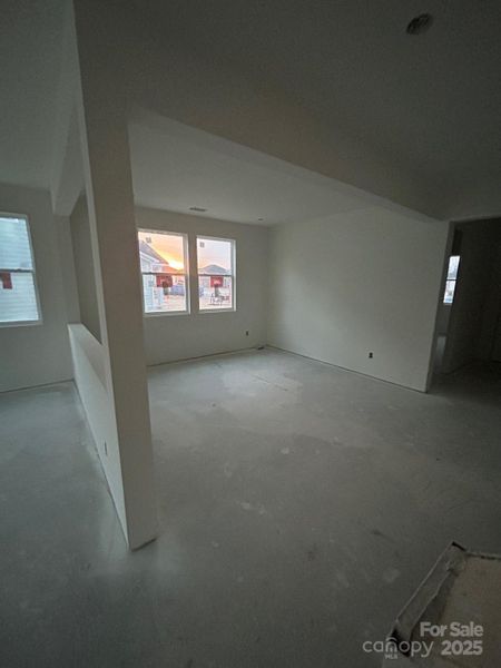 Current stage of flex room with open wall.