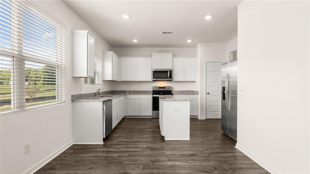 Furnished interior view inside a new home in Oakchase at Hampton, Hampton (Image 8).