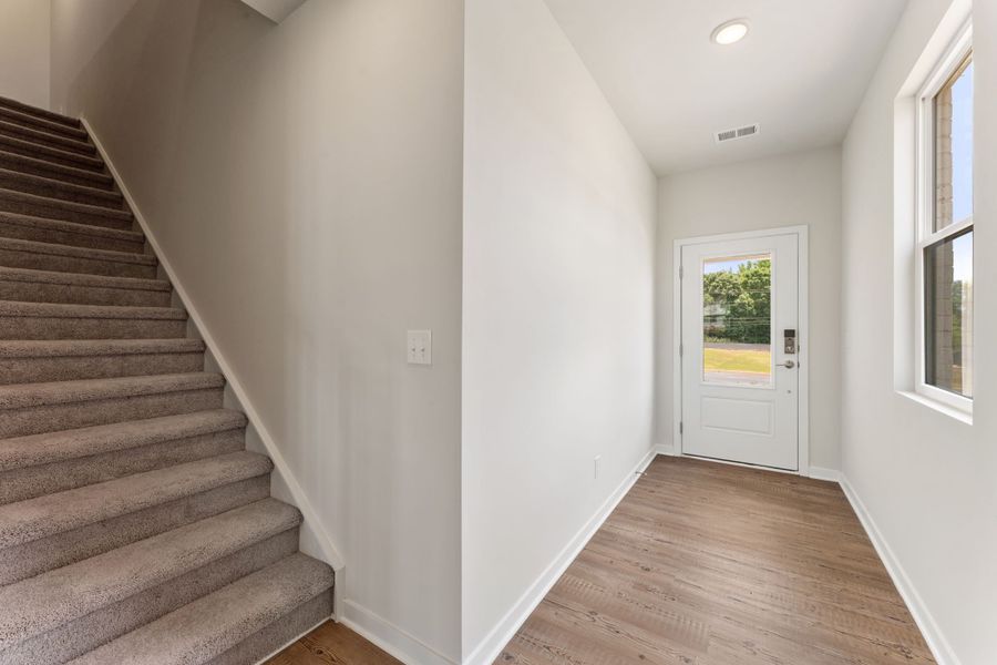 A staircase in a house. A staircase in a house.