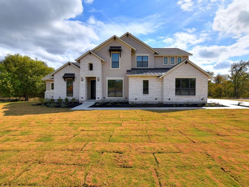 Representative exterior photo of a completed home built from the Madera II by Giddens Homes in Scofield Farms Estates, Georgetown, TX (Image 37).
