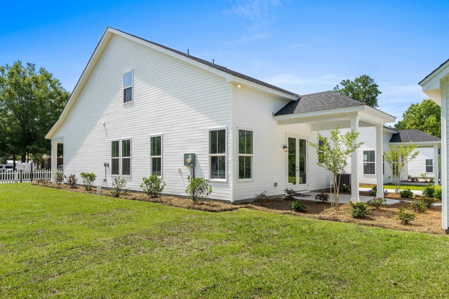 Exterior details and patio area of a home in Downtown Loris Homes, Loris (Image 4).