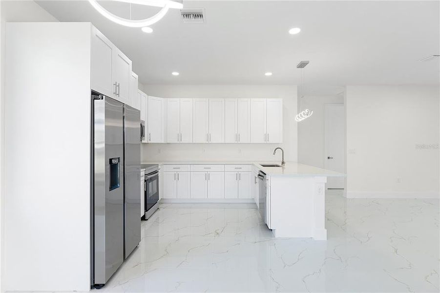 Furnished interior view inside a new home in , Port Charlotte (Image 2).