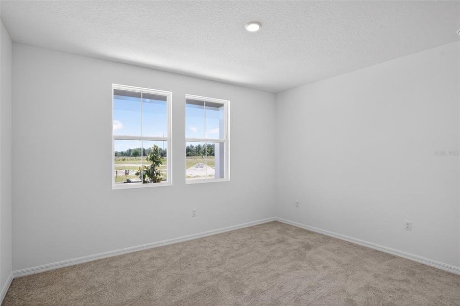 Spacious, unfurnished interior of a new home in Trailside, Mount Dora (Image 19).