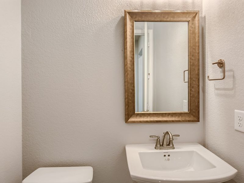 Plan 853 Powder Room Representative Photo