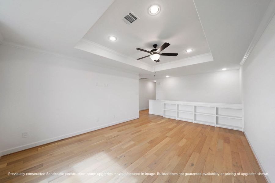 Game day, movie night, or your favorite yoga flow—this upstairs flex space with custom built-ins is ready for it all.