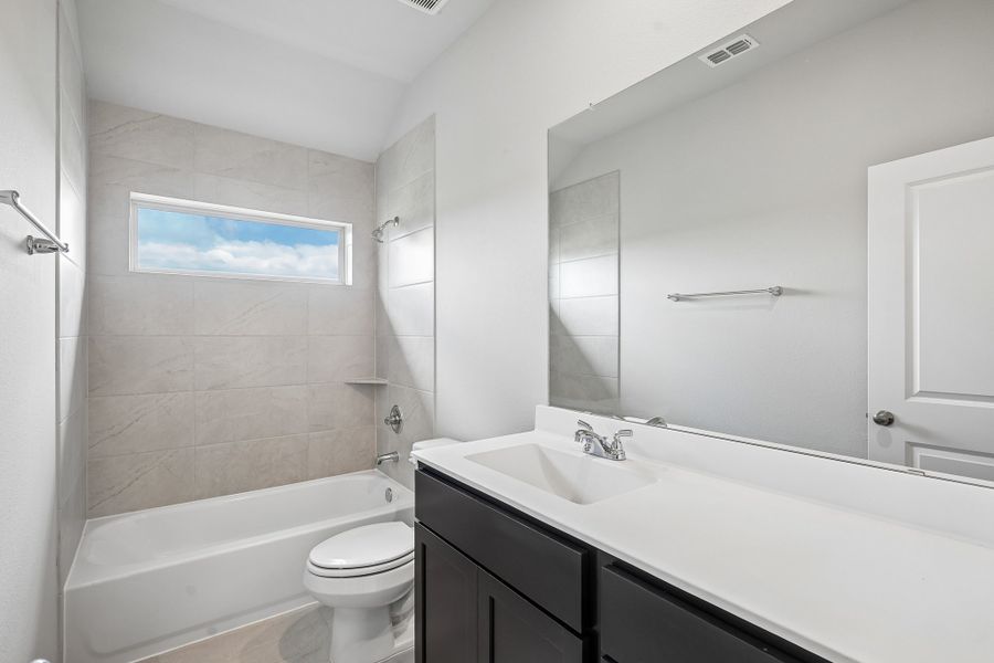 Furnished interior view inside a new home in Aldeana, Bonney (Image 12).