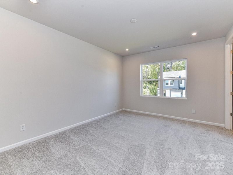 Primary Suite Filled With Natural Light.