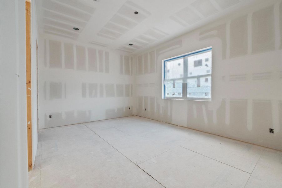 Spacious third bedroom with lots of natural light featuring a private en-suite bathroom.