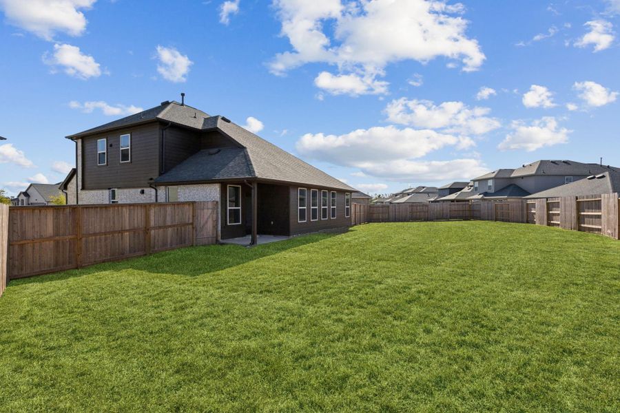 Exterior details and patio area of a home in Saint Tropez, Huffman (Image 26). Exterior details and patio area of a home in Saint Tropez, Huffman (Image 26).
