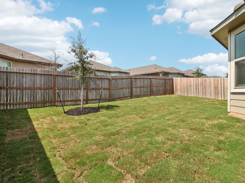 Exterior details and patio area of a home in Lark Canyon, New Braunfels (Image 21).