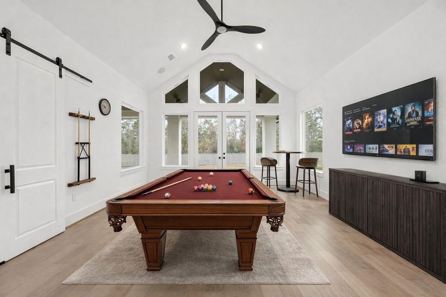 ***Virtual staged*** The game room is large enough for a pool table making it perfect for the indoor/outdoor living and gatherings.