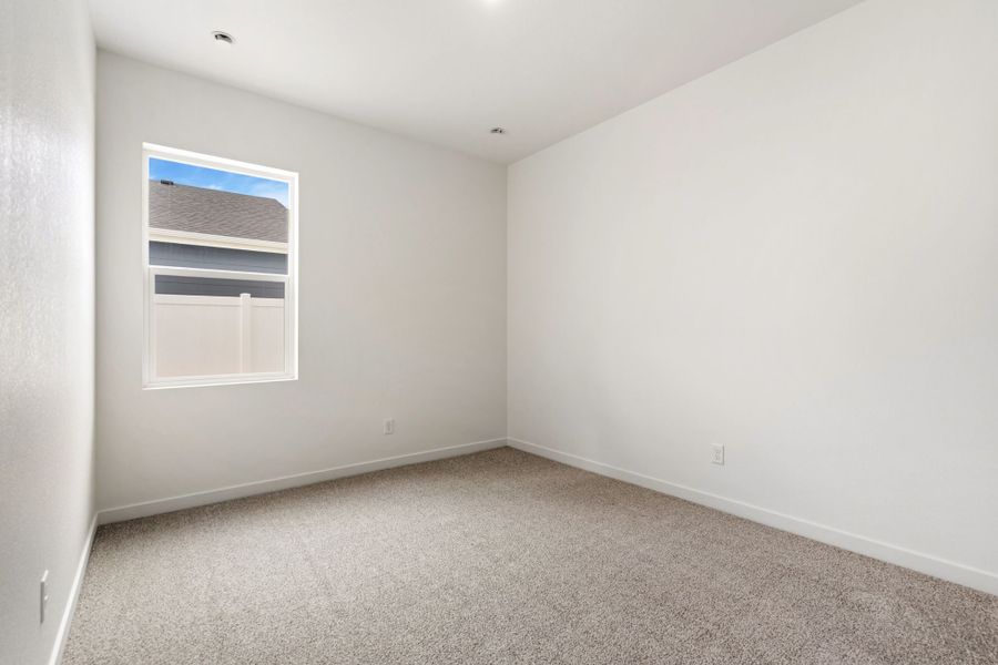 Spacious, unfurnished interior of a new home in Union Colony West, Greeley (Image 14).
