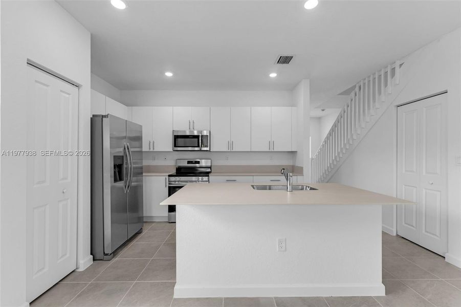Furnished interior view inside a new home in , Florida City (Image 13).