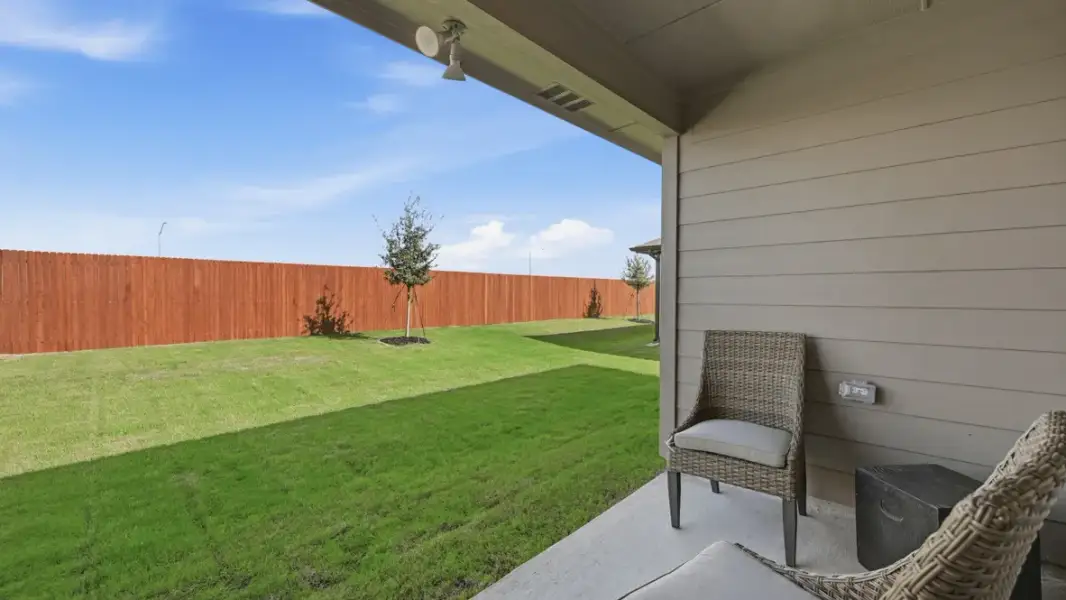 Exterior details and patio area of a home in Longhorn Estates, Fort Worth (Image 2).