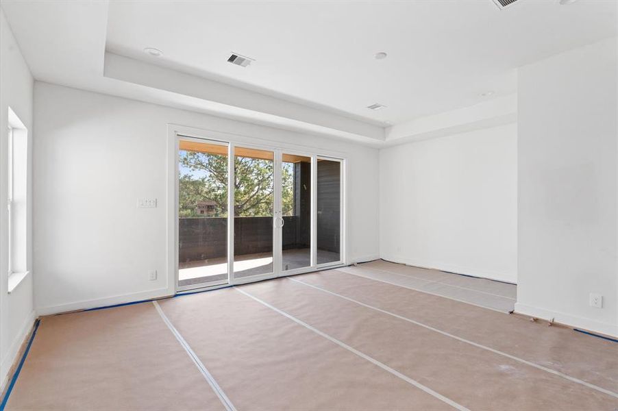 Third floor game room with covered patio that boasts great views of the city.