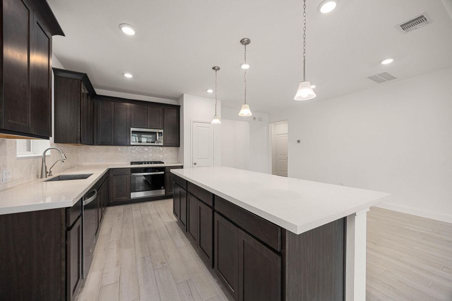 Furnished interior view inside a new home in The Highlands, Porter (Image 16).
