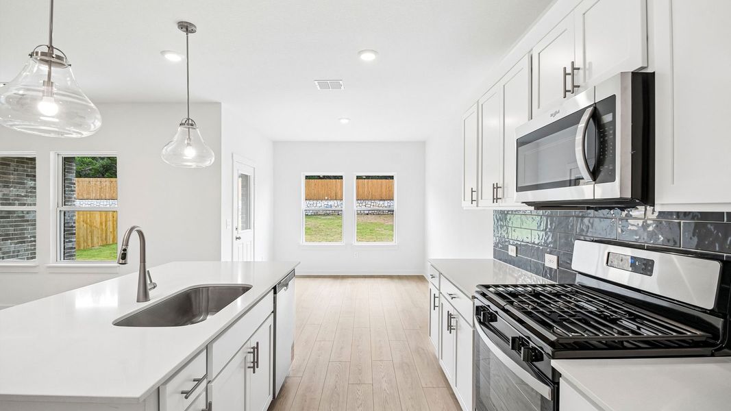 Furnished interior view inside a new home in Rosenbusch Ranch, Leander (Image 9).