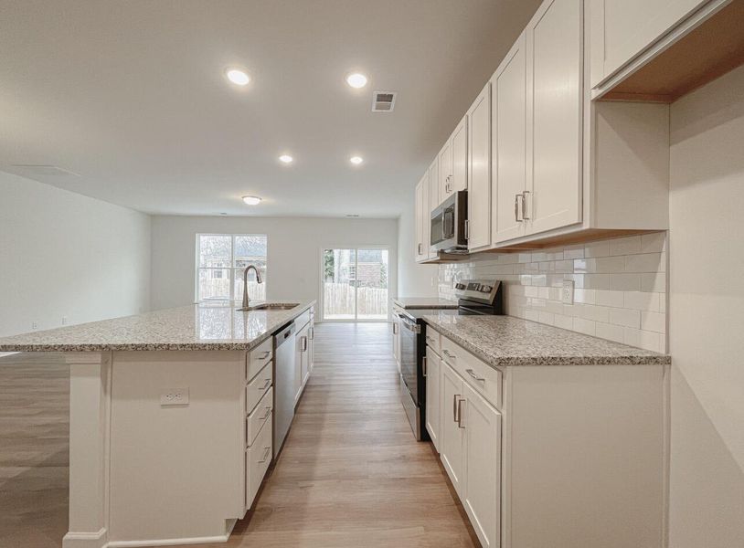 Furnished interior view inside a new home in East Main Townes, Spartanburg (Image 6).