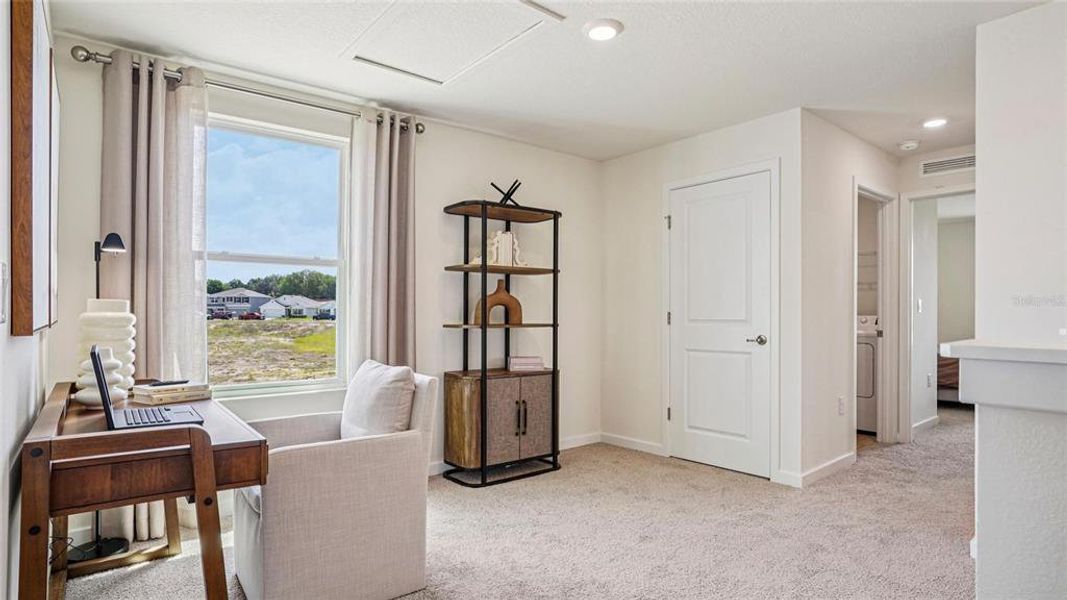 Furnished interior view inside a new home in Twisted Oaks, Wildwood (Image 4).