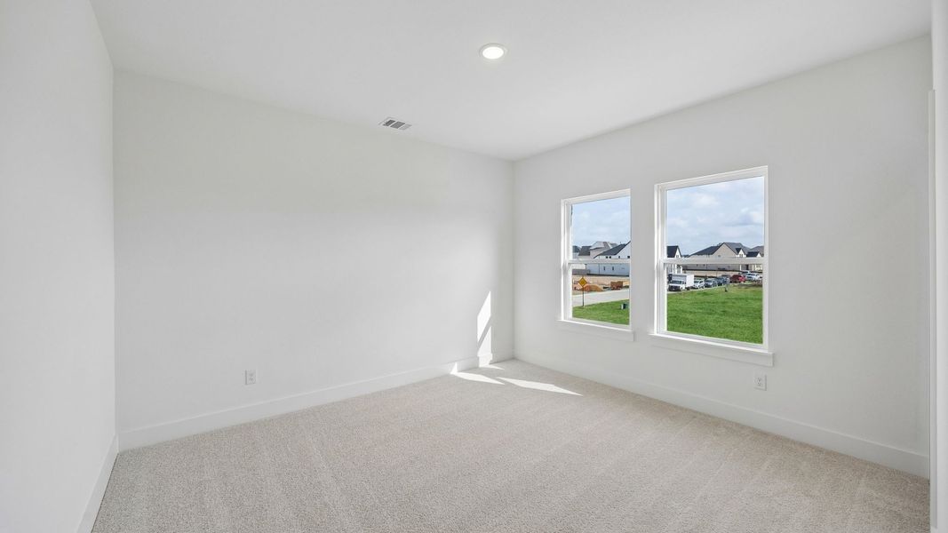 Spacious, unfurnished interior of a new home in Painted Tree 50' Series, McKinney (Image 22).