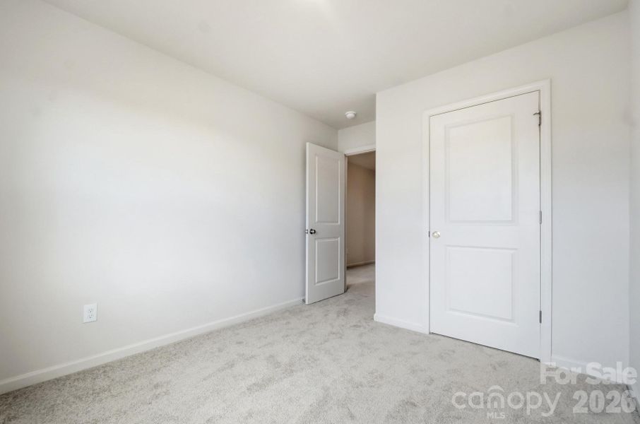 Spacious, unfurnished interior of a new home in Trivium, Newton (Image 22).