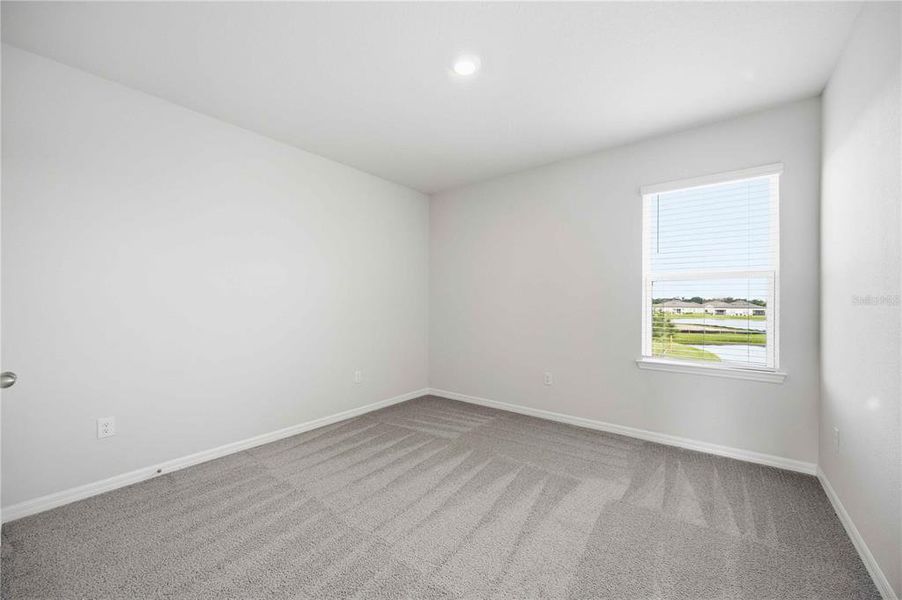Spacious, unfurnished interior of a new home in Coddington, Bradenton (Image 48).