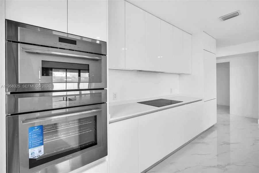 Furnished interior view inside a new home in Aria Reserve, Miami (Image 6).