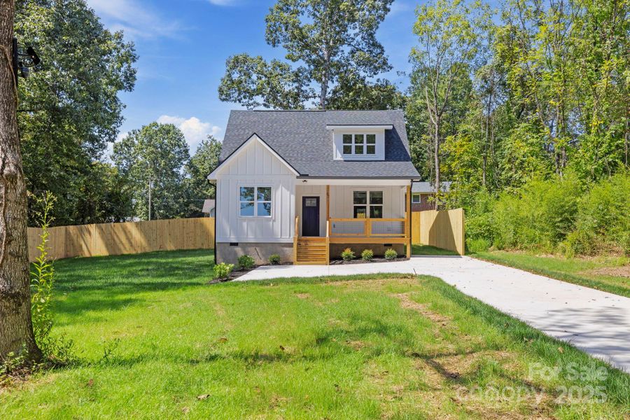 Front exterior of a new home in , Flat Rock, NC, highlighting curb appeal (Image 17).