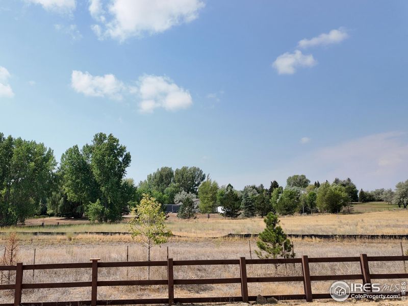 Partial wood fence backing to private open space